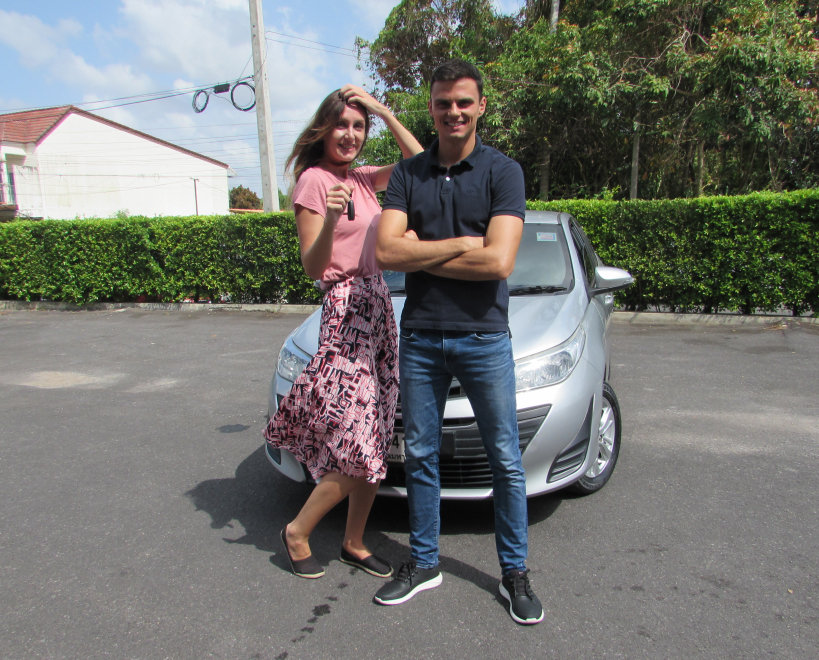 couple holding car keys